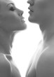 A young and lovely Caucasian couple on a white background