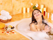 Woman take bubble  bath.