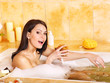 Woman take bubble  bath.