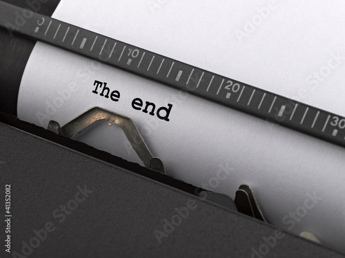 Photo: "The end" message typed by vintage typewriter. "The end" message typed by vintage typewriter.