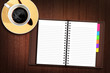 Personal Organizer on Wood Table with a cup of coffee