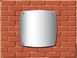 Metal screen on a brick wall