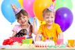 happy kids girl and boy celebrating birthday party