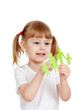 Little girl holding and showing on family cutting from paper