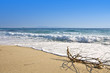 Sunny summer beach at the mediterranean coast in Greece