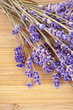 Dried lavender on a wooden desk Dried lavender on a wooden desk