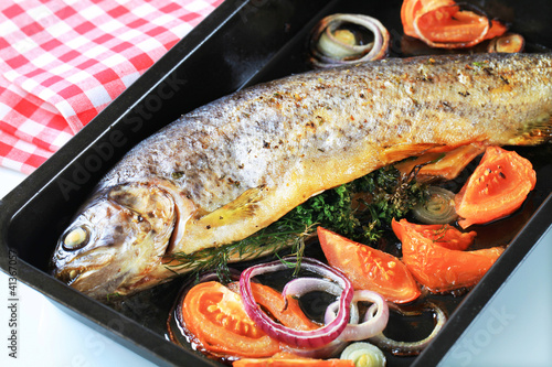 Photo: Herb-stuffed trout with tomatoes Herb-stuffed trout with tomatoes