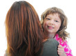 cheerful girl hugs her young mother. cheerful girl hugs her young mother.