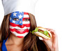 Photo: American woman eating hamburger American woman eating hamburger