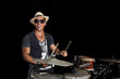 Cuban percussionist isolated on black