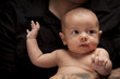 Young Father Holding His Mixed Race Newborn Baby