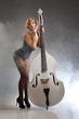 Young Woman In Lingerie With A Double Bass