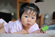 Photo: Chinese baby lying in bed Chinese baby lying in bed