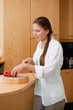 Woman cutting a pepper