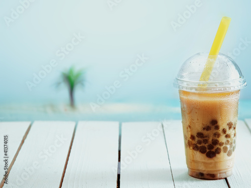 Photo: Iced drink in a covered cup Iced drink in a covered cup