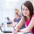 in the library - pretty female student in the library - pretty female student