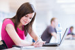 in the library - pretty female student in the library - pretty female student