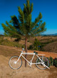 The White bicycle on mountain background