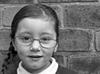 Young girl wearing glasses Young girl wearing glasses