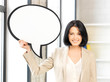 smiling businesswoman with blank text bubble