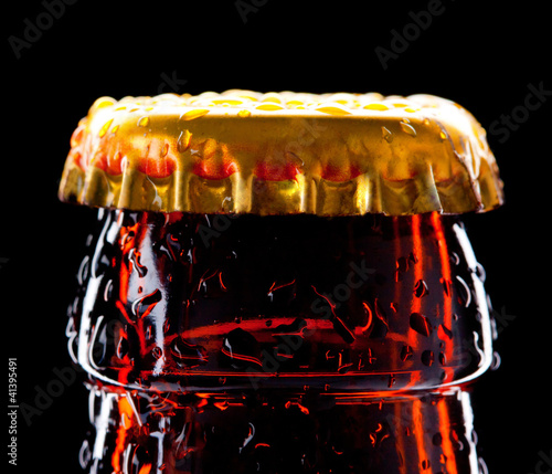 Photo: Top of wet beer bottle Top of wet beer bottle