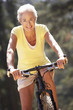 Senior woman on country bike ride