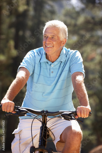 Photo: Senior man on country bike ride Senior man on country bike ride