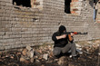 Photo: Man with gun Man with gun