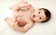 Baby holding his feet