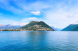 Lugano Lake landscape. City and mountains. Ticino, Swiss, Europe Lugano Lake landscape. City and mountains. Ticino, Swiss, Europe