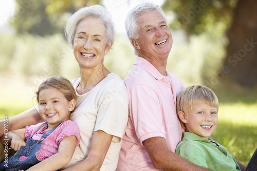 Photo: Grandparents with grandchildren in the country Grandparents with grandchildren in the country