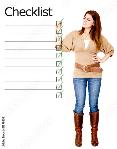 Photo: Woman with checklist Woman with checklist