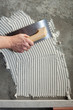 construction notched trowel with white cement