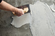 construction notched trowel with white cement