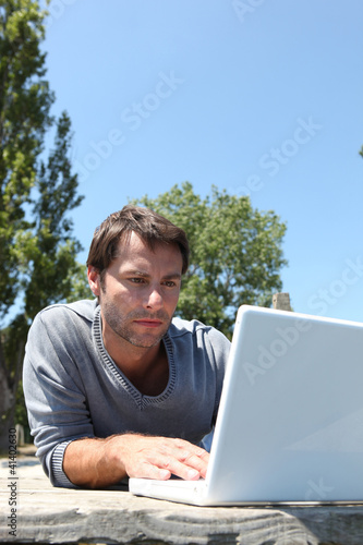 Photo: Man working in park Man working in park