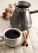 Cup of coffee with cinnamon