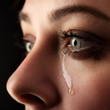 beauty girl cry on black background