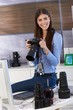 Happy photographer girl at work