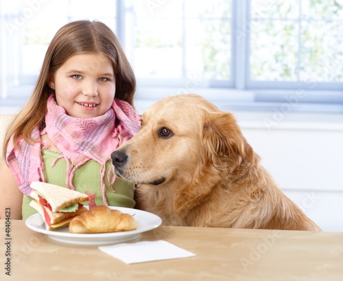Photo: Portrait of little girl and dog smiling Portrait of little girl and dog smiling