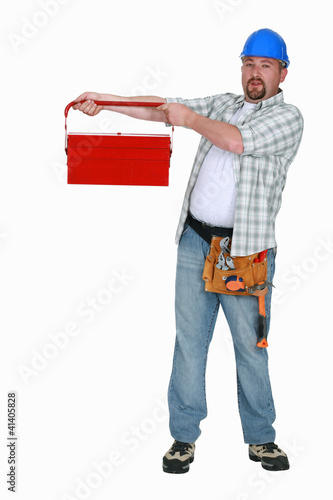 Photo: Chunny worker lifting tool-box Chunny worker lifting tool-box