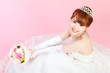 Beautiful asian woman dressed as a bride