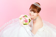 Beautiful asian woman dressed as a bride
