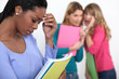 Photo: Sad student excluded by friends Sad student excluded by friends