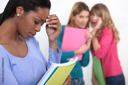 Photo: Sad student excluded by friends Sad student excluded by friends