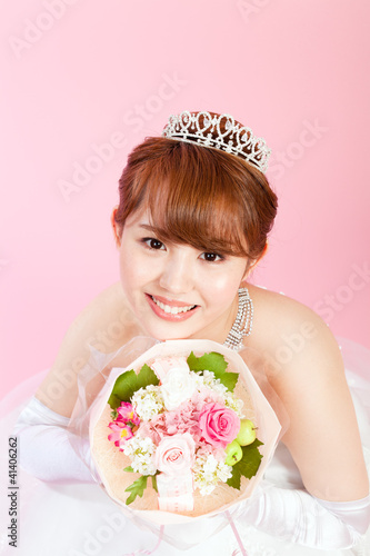 Photo: Beautiful asian woman dressed as a bride Beautiful asian woman dressed as a bride