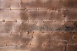 old rusty iron surface with rivets