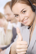 Photo: Closeup of a female customer service representative Closeup of a female customer service representative