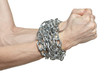 Photo: Man hands fettered with chain, slave symbol Man hands fettered with chain, slave symbol