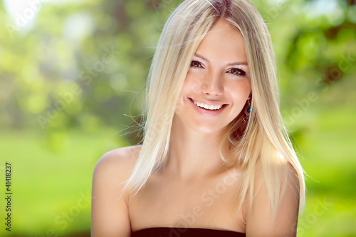 Photo: Portrait of happy blond woman Portrait of happy blond woman