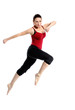 Girl in sportswear jumping jumping over white